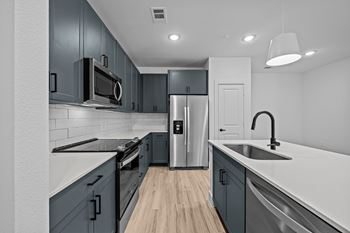 Deep basin kitchen sinks